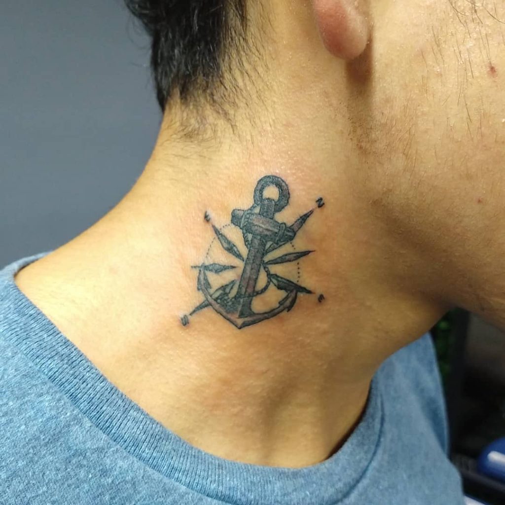 Anchor and compass tattoo